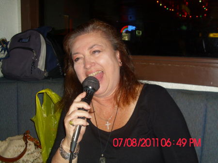 Karaoke Queen at a Karaoke Bar.