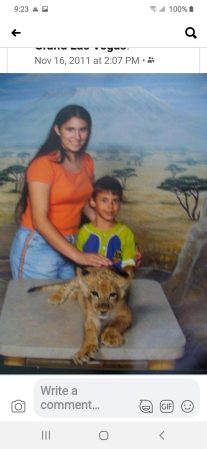 Courtney and Sean petting.lion MGM Grand Vegas