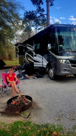 Linda at campsite at East Bank.