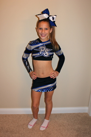 Camrynn is a flyer on a Competition Cheer Team