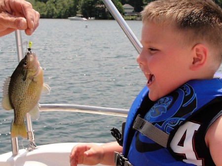 Grandson, Caden fishing on Lake George, NY.