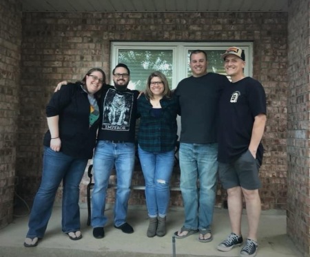 My three and two of Ed’s on our front porch a!