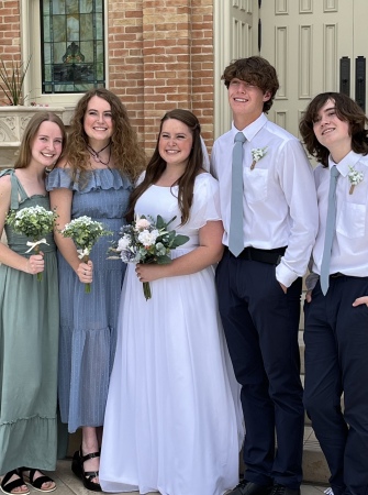 Oldest granddaughter’s wedding with siblings 