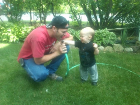 Cam's 1st drink from the hose.