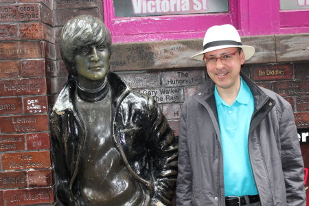 Posing with John Lennon outside The Cavern.