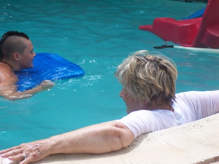 MOM, PAXTON, PAYTON AND ME IN MY POOL