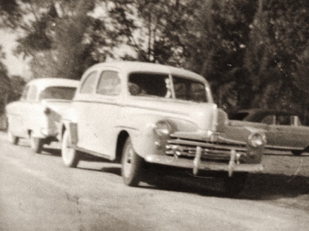 My first car,47 Ford sedan and my spoiled brot