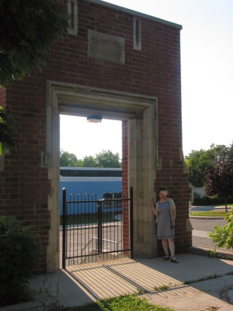 Standing beside the old entrance of Blantyre school