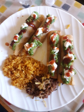 Taquitos. rice and beans, yumm