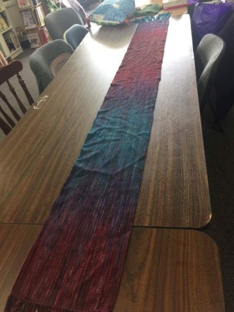 Pooled warp scarf