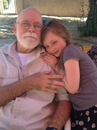 my husband and our granddaughter at our home in Arizona