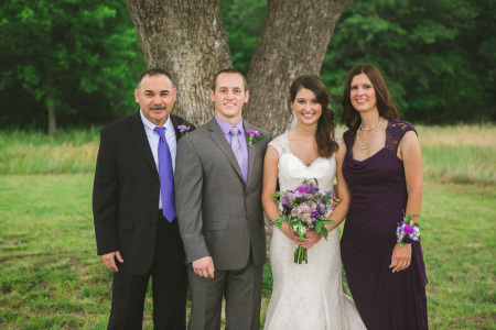 My new son in law with my daughter & wife.