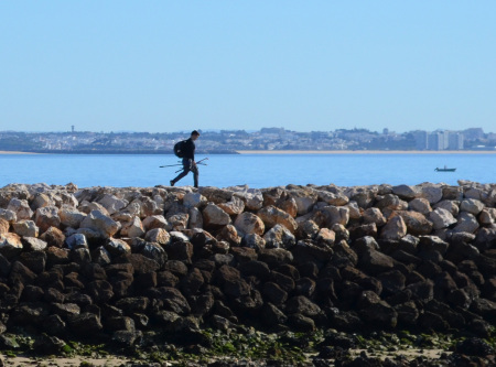 Shell fishing on the breakwall 