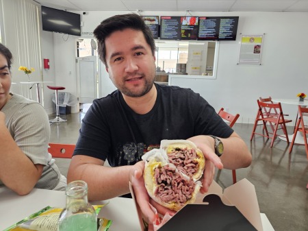 Our son, Sebastian, with a huge pastrami sandw