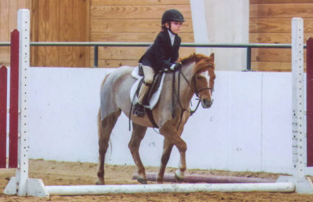 Sydney training her horse