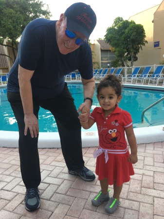 Elyse visiting Grandpa in Florida. 
