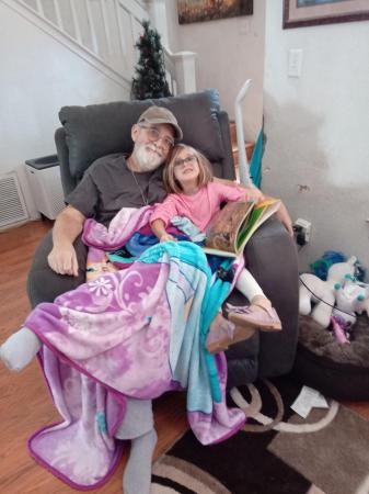 Relaxing with my darling granddaughter. 