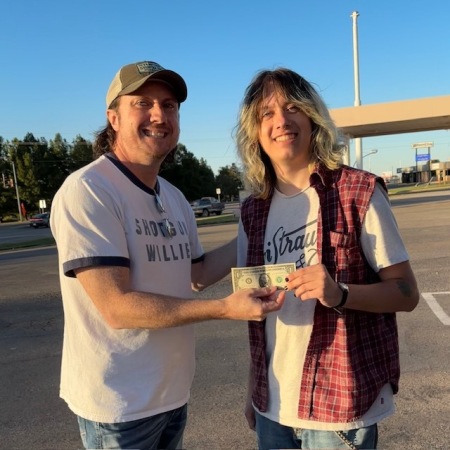 Zane with his FIRST guitar pickin' dollar!!