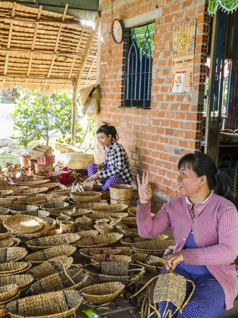 Villagers Making Baskets Out Of Hyacinth