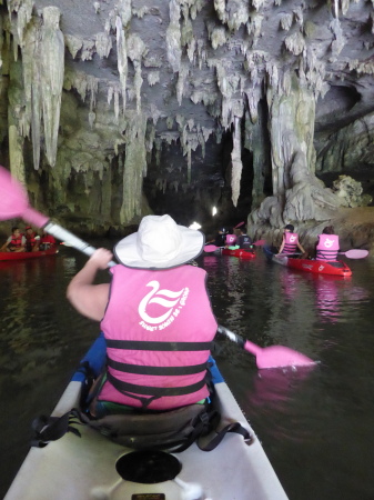 Kayaking through limestone caves. 