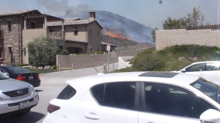 Looking out from my courtyard to a fire