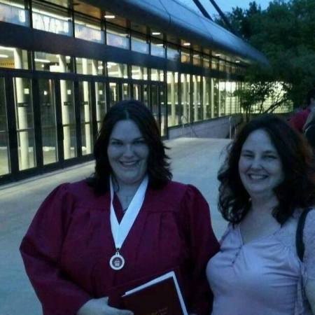 Our daughter with Jennifer - GRAD!