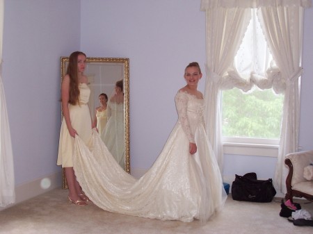 Granddaughter,Erin, wearing my wedding dress