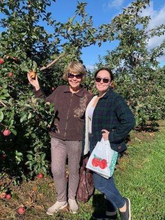 Grand daughter at apple orchard