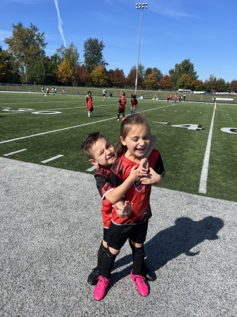 Kyle and Ava on soccer field 