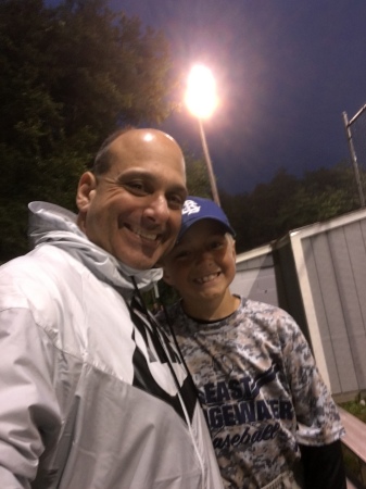 Me with my nephew Nathan at his baseball game.