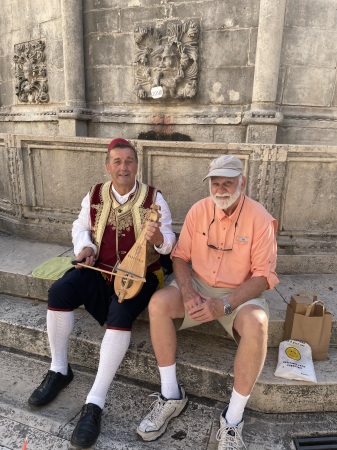 Pausing with a musician in Croatia